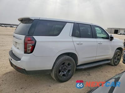 Trzecie zdjęcie samochodu z tyłu: 2022 CHEVROLET TAHOE C1500 VIN:1GNSCLED1NR247874 - miniatura