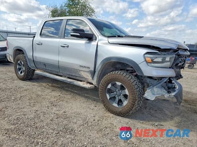 Czwarte zdjęcie samochodu z boku: 2019 RAM TRUCKS 1500 REBEL VIN:1C6SRFLT6KN722626 - miniatura