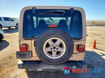 Zdjęcie 6 z 13 samochodu: 1999 JEEP WRANGLER / TJ SPORT VIN:1J4FY19S0XP407289 - miniatura
