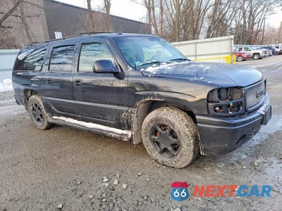 Czwarte zdjęcie samochodu z boku: 2003 GMC YUKON XL DENALI VIN:1GKFK66U33J293798 - miniatura