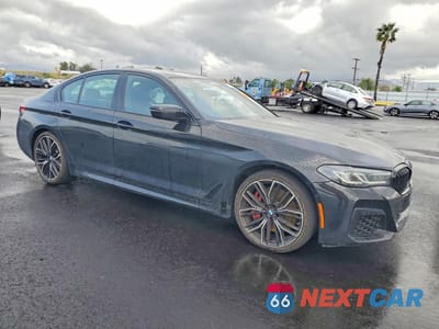 Czwarte zdjęcie samochodu z boku: 2023 BMW 540 I VIN:WBA53BJ09PWX98283 - miniatura
