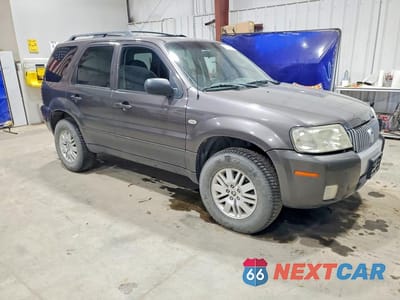 Czwarte zdjęcie samochodu z boku: 2006 MERCURY MARINER VIN:4M2YU57126KJ17718 - miniatura
