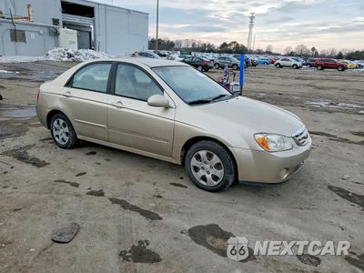 Czwarte zdjęcie samochodu z boku: 2004 KIA SPECTRA LX VIN:KNAFE121345058584 - miniatura