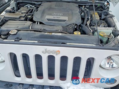 Zdjęcie 11 z 12 samochodu: 2015 JEEP WRANGLER UNLIMITED SAHARA VIN:1C4BJWEGXFL742668 - miniatura