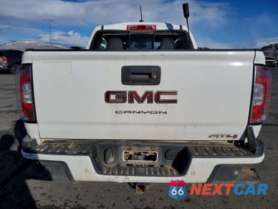 Zdjęcie 6 z 13 samochodu: 2022 GMC CANYON AT4 VIN:1GTP6FE11N1196095 - miniatura