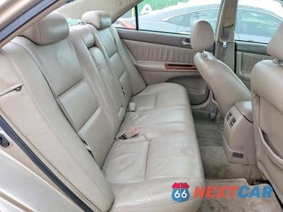 Zdjęcie 10 z 11 samochodu: 2003 TOYOTA CAMRY LE VIN:4T1BE30K03U739195 - miniatura