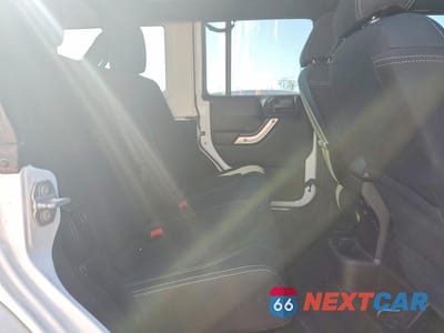 Zdjęcie 10 z 11 samochodu: 2015 JEEP WRANGLER UNLIMITED SAHARA VIN:1C4BJWEG9FL718118 - miniatura