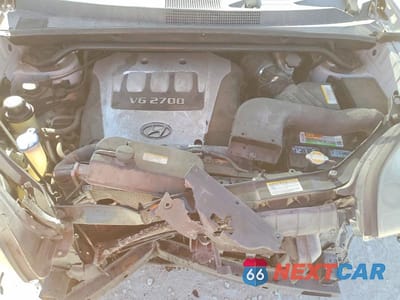 Zdjęcie 12 z 14 samochodu: 2006 HYUNDAI TUCSON GLS VIN:KM8JN12D46U323685 - miniatura