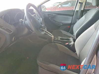 Zdjęcie 7 z 12 samochodu: 2014 FORD FOCUS S VIN:1FADP3E20EL169830 - miniatura