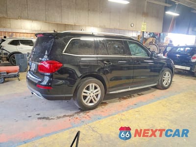 Trzecie zdjęcie samochodu z tyłu: 2014 MERCEDES-BENZ GL 450 4MATIC VIN:4JGDF7CE6EA418799 - miniatura