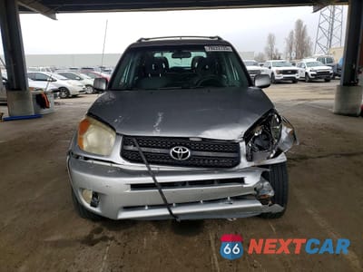 Piąte zdjęcie samochodu w środku: 2004 TOYOTA RAV4 BASE VIN:JTEHD20V040011810 - miniatura