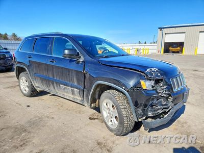 Czwarte zdjęcie samochodu z boku: 2016 JEEP GRAND CHEROKEE LAREDO VIN:1C4RJFAG6GC332259 - miniatura