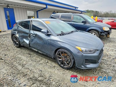 Czwarte zdjęcie samochodu z boku: 2020 HYUNDAI VELOSTER 2.0L VIN:KMHTG6AF5LU022132 - miniatura