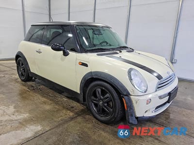 Czwarte zdjęcie samochodu z boku: 2006 MINI COOPER VIN:WMWRC33556TK16227 - miniatura