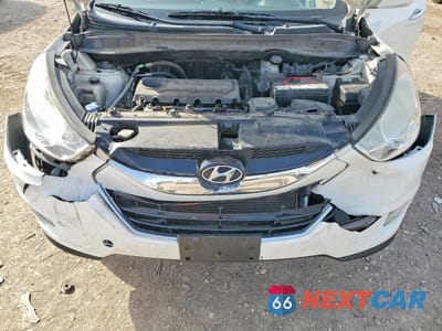 Zdjęcie 12 z 13 samochodu: 2013 HYUNDAI TUCSON VIN:KM8JUCAC4DU663570 - miniatura