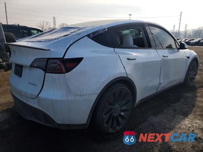 Trzecie zdjęcie samochodu z tyłu: 2023 TESLA MODEL Y VIN:7SAYGDEF7PF936795 - miniatura