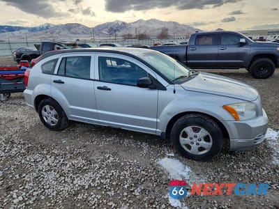 Czwarte zdjęcie samochodu z boku: 2010 DODGE CALIBER EXPRESS VIN:1B3CB1HA1AD587668 - miniatura