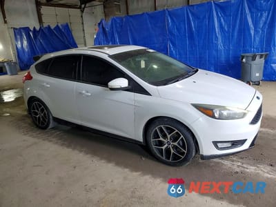 Czwarte zdjęcie samochodu z boku: 2017 FORD FOCUS SEL VIN:1FADP3M2XHL248802 - miniatura