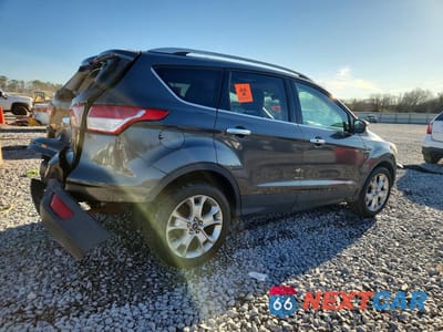 Trzecie zdjęcie samochodu z tyłu: 2015 FORD ESCAPE TITANIUM VIN:1FMCU9J96FUC82399 - miniatura