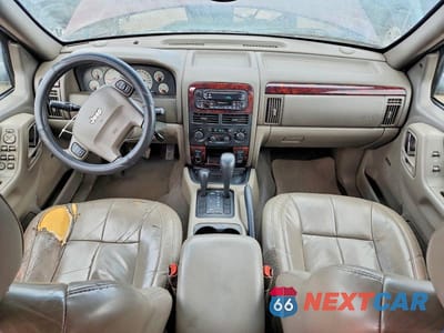 Zdjęcie 8 z 11 samochodu: 2001 JEEP GRAND CHEROKEE LIMITED VIN:1J4GW58NX1C739980 - miniatura
