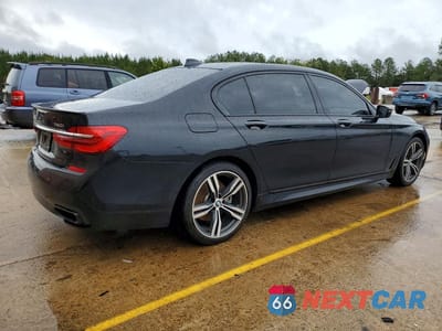 Trzecie zdjęcie samochodu z tyłu: 2019 BMW 740 I VIN:WBA7E2C50KB218298 - miniatura