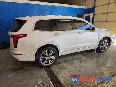 Trzecie zdjęcie samochodu z tyłu: 2022 CADILLAC XT6 PREMIUM LUXURY VIN:1GYKPDRS4NZ143952 - miniatura