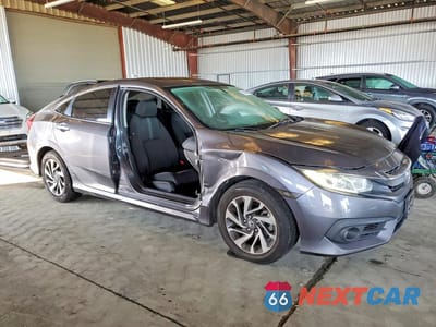 Czwarte zdjęcie samochodu z boku: 2018 HONDA CIVIC EX VIN:19XFC2F7XJE002865 - miniatura