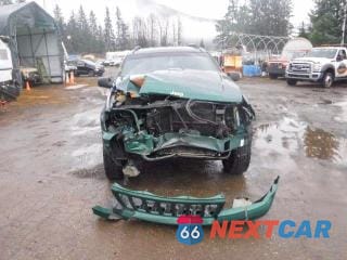 Piąte zdjęcie samochodu w środku: 1999 JEEP GRAND CHEROKEE LIMITED VIN:1J4GW68N3XC639363 - miniatura