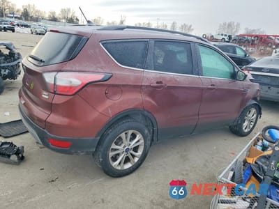 Trzecie zdjęcie samochodu z tyłu: 2018 FORD ESCAPE SEL VIN:1FMCU0HD7JUA51977 - miniatura