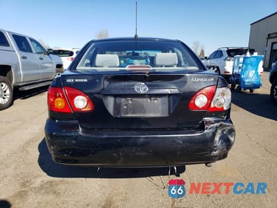 Zdjęcie 6 z 11 samochodu: 2003 TOYOTA COROLLA CE VIN:JTDBR32E330028694 - miniatura