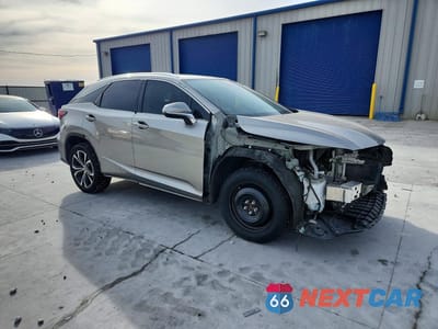 Czwarte zdjęcie samochodu z boku: 2022 LEXUS RX 350 BASE VIN:2T2HZMAA0NC242948 - miniatura