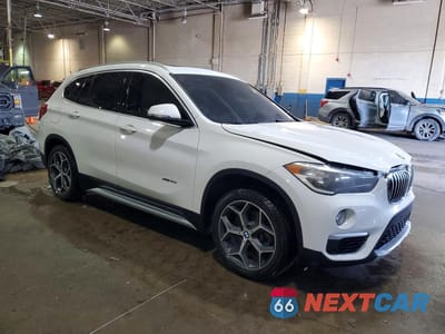 Czwarte zdjęcie samochodu z boku: 2018 BMW X1 XDRIVE28I VIN:WBXHT3C35J5K23370 - miniatura
