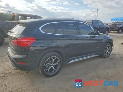Trzecie zdjęcie samochodu z tyłu: 2018 BMW X1 SDRIVE28I VIN:WBXHU7C33J5H39220 - miniatura