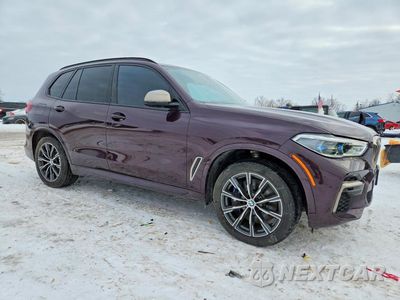 Czwarte zdjęcie samochodu z boku: 2022 BMW X5 M50I VIN:5UXJU4C00N9K08991 - miniatura