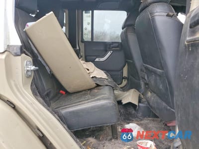 Zdjęcie 10 z 13 samochodu: 2017 JEEP WRANGLER UNLIMITED SAHARA VIN:1C4HJWEG3HL674243 - miniatura