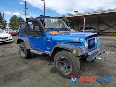 Czwarte zdjęcie samochodu z boku: 1999 JEEP WRANGLER / TJ SE VIN:1J4FY29P2XP481430 - miniatura