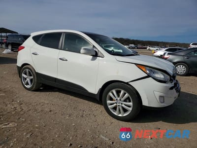 Czwarte zdjęcie samochodu z boku: 2013 HYUNDAI TUCSON VIN:KM8JUCAC4DU663570 - miniatura