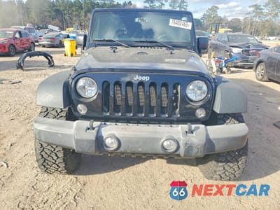 Piąte zdjęcie samochodu w środku: 2016 JEEP WRANGLER UNLIMITED SPORT VIN:1C4BJWDG7GL286891 - miniatura