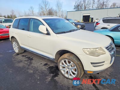 Czwarte zdjęcie samochodu z boku: 2009 VOLKSWAGEN TOUAREG 2 V6 TDI VIN:WVGFM77L39D033213 - miniatura