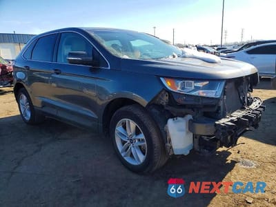 Czwarte zdjęcie samochodu z boku: 2018 FORD EDGE SEL VIN:2FMPK4J90JBB64325 - miniatura