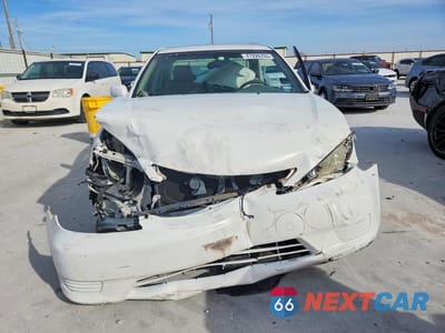 Piąte zdjęcie samochodu w środku: 2006 TOYOTA CAMRY LE VIN:4T1BF32K16U624426 - miniatura