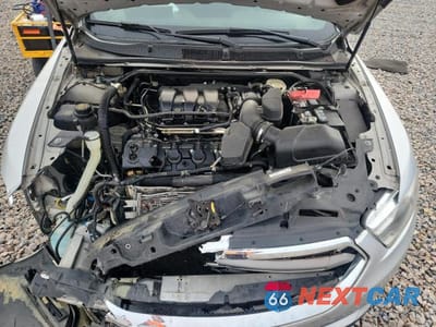 Zdjęcie 11 z 12 samochodu: 2013 FORD TAURUS SEL VIN:1FAHP2E81DG190113 - miniatura