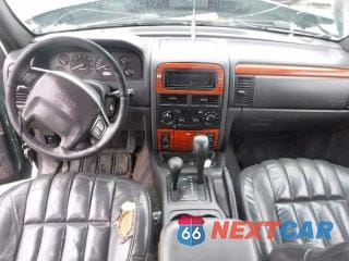 Zdjęcie 8 z 12 samochodu: 1999 JEEP GRAND CHEROKEE LIMITED VIN:1J4GW68N3XC639363 - miniatura