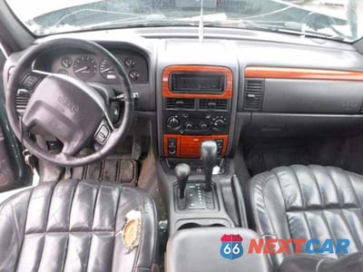 Zdjęcie 8 z 12 samochodu: 1999 JEEP GRAND CHEROKEE LIMITED VIN:1J4GW68N3XC639363 - miniatura