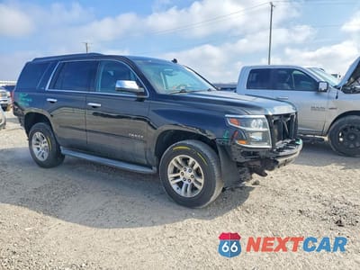 Czwarte zdjęcie samochodu z boku: 2015 CHEVROLET TAHOE K1500 LS VIN:1GNSKAKC3FR110536 - miniatura