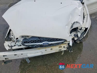 Zdjęcie 11 z 13 samochodu: 2000 FORD TAURUS LX VIN:1FAFP5221YA243068 - miniatura