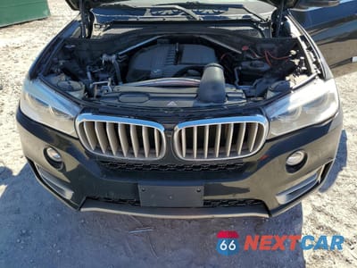 Zdjęcie 12 z 14 samochodu: 2015 BMW X5 XDRIVE35I VIN:5UXKR0C5XF0K71547 - miniatura