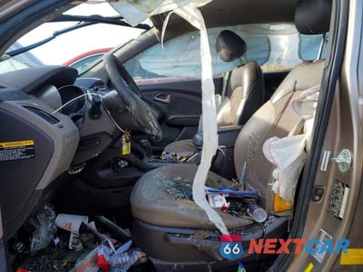 Zdjęcie 7 z 13 samochodu: 2010 HYUNDAI TUCSON GLS VIN:KM8JU3AC0AU018281 - miniatura