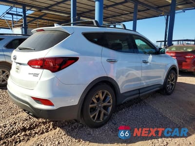 Trzecie zdjęcie samochodu z tyłu: 2018 HYUNDAI SANTA FE SPORT 2.0T ULTIMATE VIN:5XYZW4LA2JG535425 - miniatura