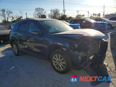 Czwarte zdjęcie samochodu z boku: 2016 MAZDA CX-5 TOURING VIN:JM3KE4CY1G0901222 - miniatura
